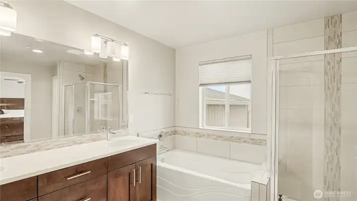 Bathroom also has a separate water closet for privacy.