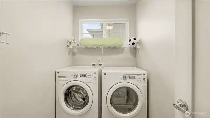 Upstairs laundry room.