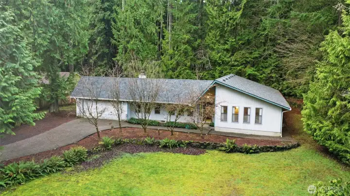 Picture in your mind's eye the popping of spring and summer colors, consider the various ways to take advantage of this private lot and neighborhood, relax in the freshness of new flooring and paint, and rest in the peace of mind that comes with several new elements in this home!