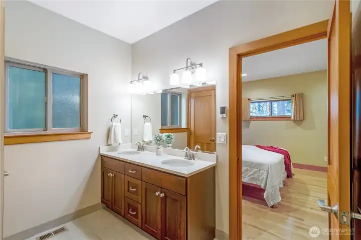 Ensuite vanity with double sinks and ample counter space Ensuite vanity with double sinks and ample counter space