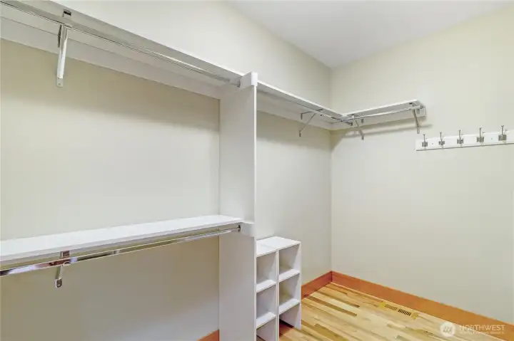 Large walk-in closet with extensive hanging space Large walk-in closet with extensive hanging space
