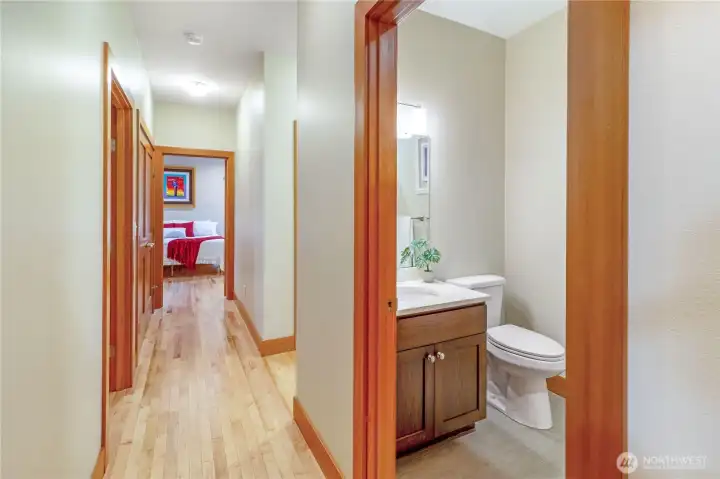 Hallway connecting bedrooms and bathroom