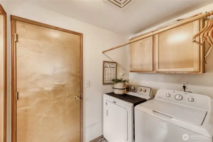 Laundry room leading to the garage