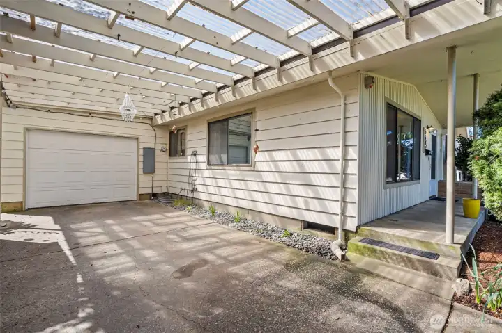 Attached one car garage and carport