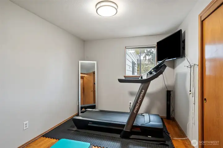 Bedroom number three is currently used a home gym