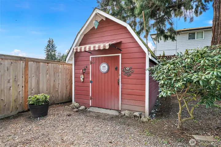 Utility shed has been finished out with drywall and electricity