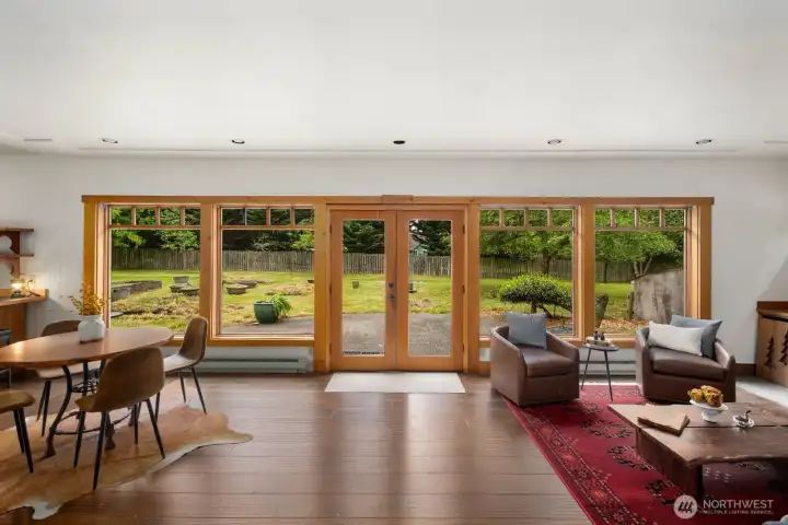 A wall of windows welcomes you to the main living space.
