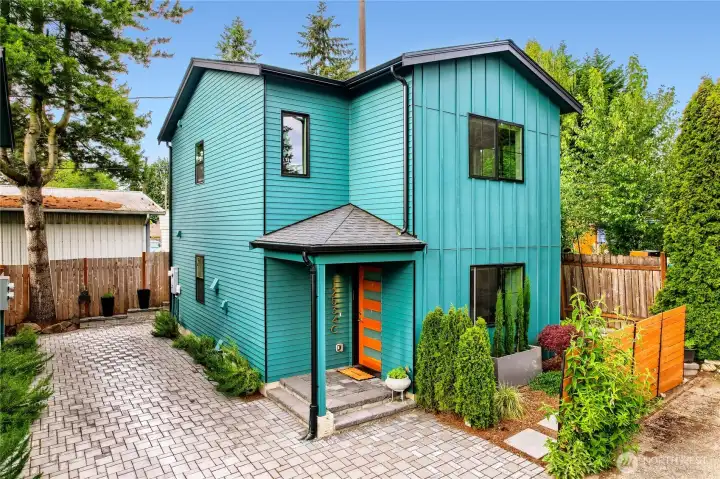 Front of home with 2 parking spaces.