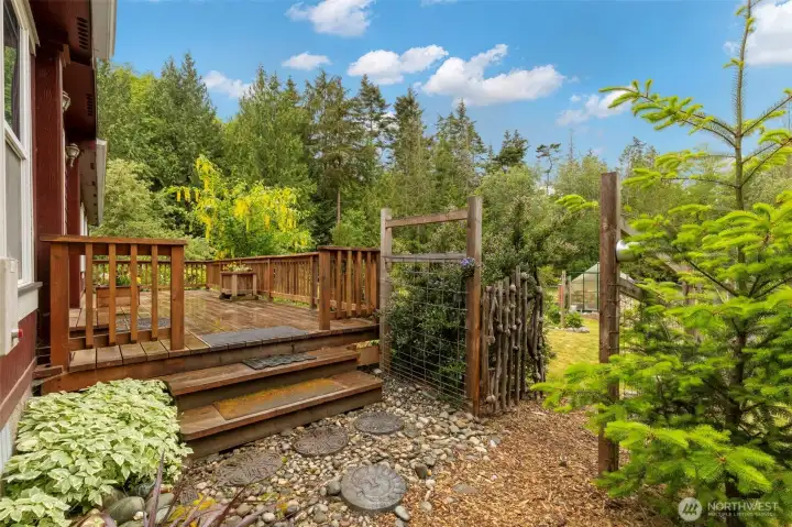 A new front porch with sweeping views of the property ahead- yet with 1/2 of the usable land still sitting behind!