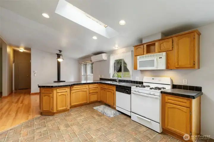 A completely functional kitchen that could probably benefit from some upgrades to match the rest of the home, this is the only area that you might want to add your own touches to.
