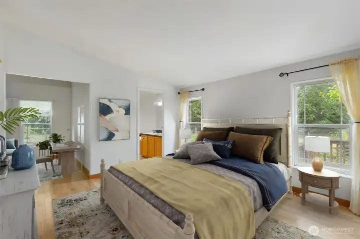 The main bedroom with en suite is large and comfortable, with it's own sitting area and beautiful, large bathroom.