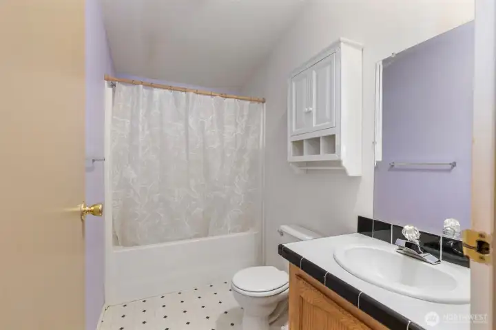 Second bathroom in the main area and adjacent to the two other bedrooms.