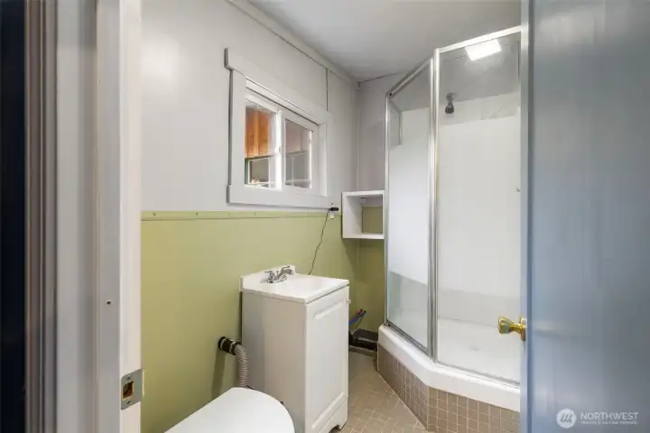The composting toilet and shower in the studio/shop.
