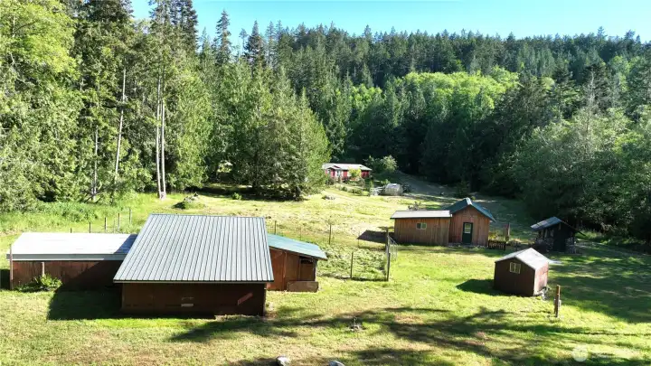 An aerial from behind and above the stables.