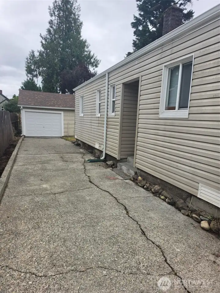 Back door from Kitchen onto driveway. Northside