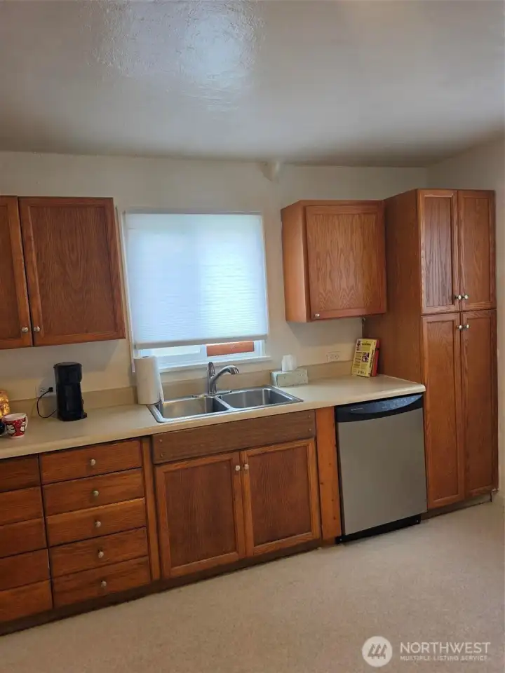 Kitchen counter.  Wash dishes looking out over Snyder watching your neighbors coming home.