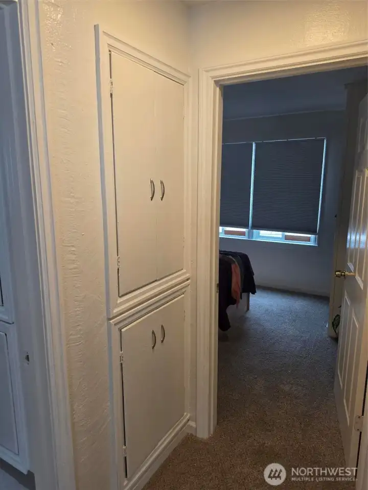 Hallway storage at entry to 2nd bedroom