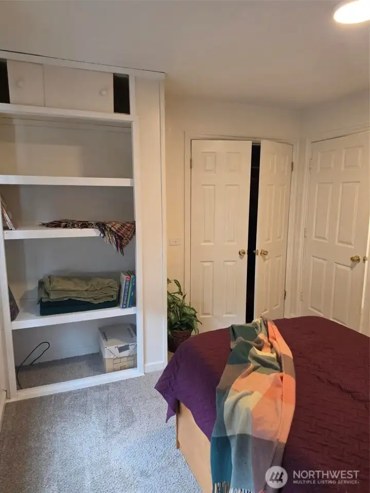 2nd bedroom Shelving unit & French door closet