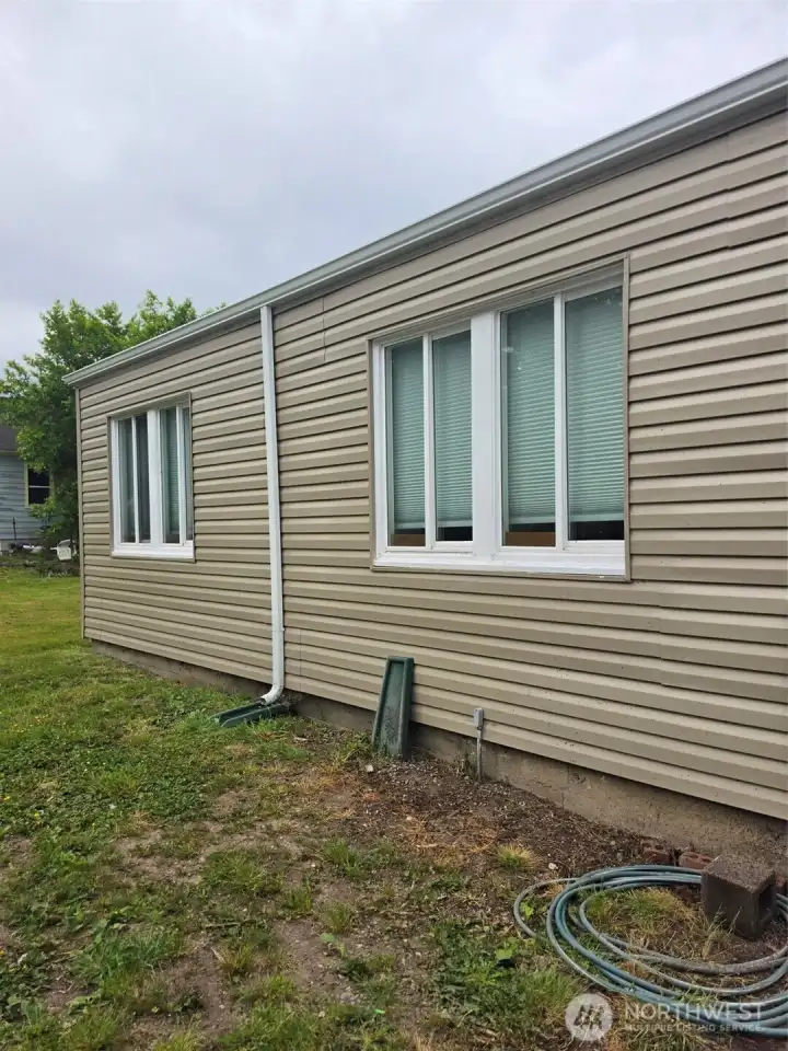 Rear of your new home showing the two bedrooms new double pane windows.