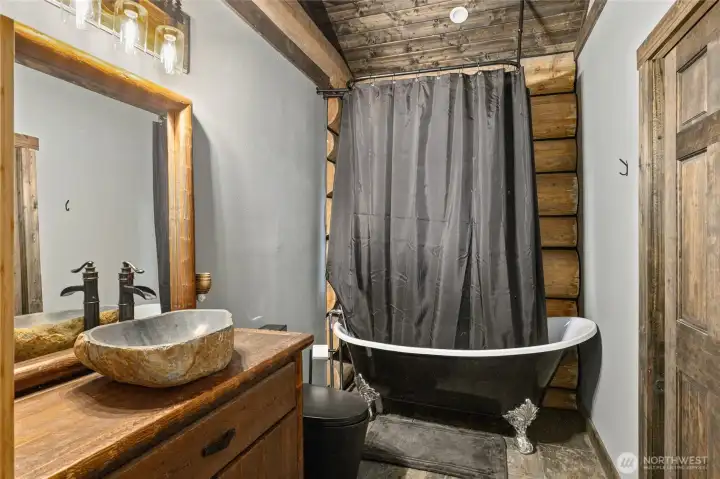 Here is a photo of the hall way bathroom. You can see a door to the right that enters into the guest bedroom. Here is a photo of the hall way bathroom. You can see a door to the right that enters into the guest bedroom.