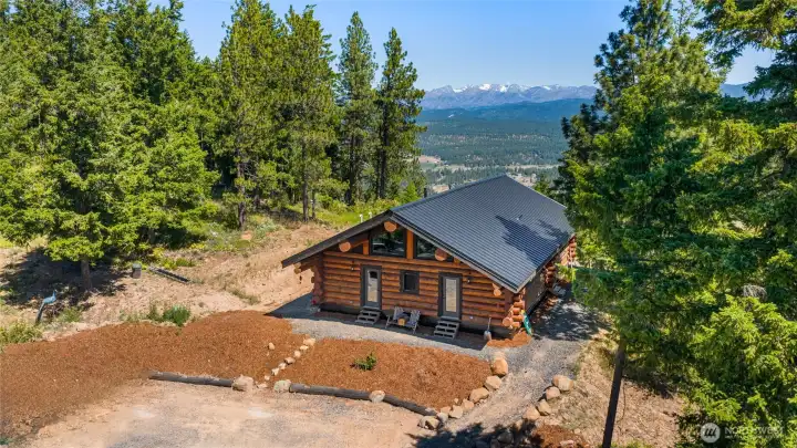 Another view of the front of the home and the amazing mountain views from the back of the home. Another view of the front of the home and the amazing mountain views from the back of the home.