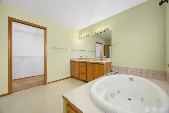 Primary bathroom with walk-in closet Primary bathroom with walk-in closet