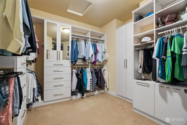 Walk-in closet with California built cabinets