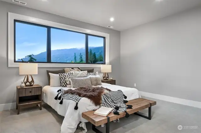 Upstairs 2nd primary bedroom surrounded by nature.