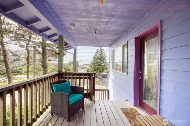 Covered deck (composite) with ocean in background.
