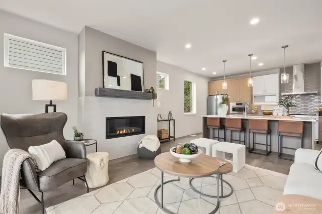 Gourmet kitchen, and lovely living room with plenty of of space to host guests and have them over to watch a game or host a movie night