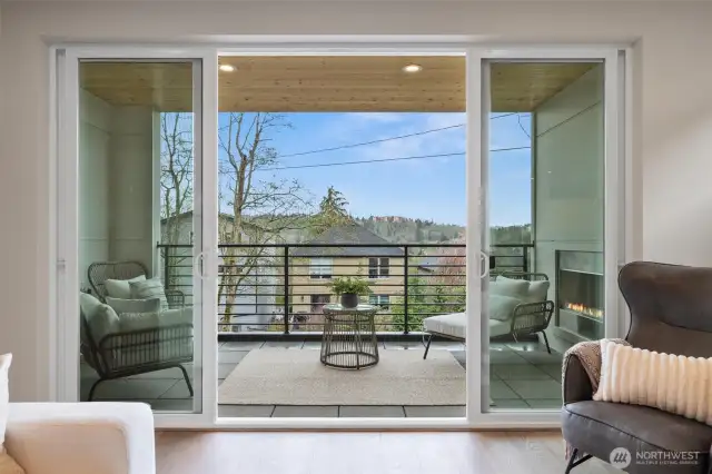 Looking from living room to outdoor covered, heated deck