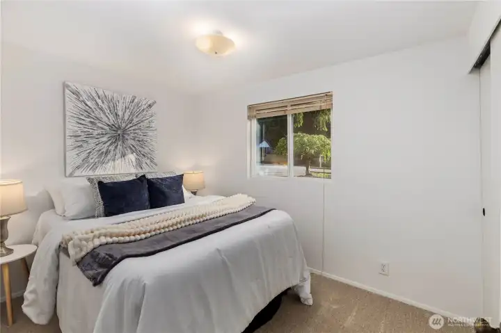 Bedroom #1 with large closet and window coverings