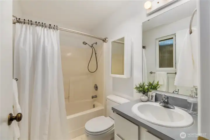 Full private bathroom off of primary bedroom.