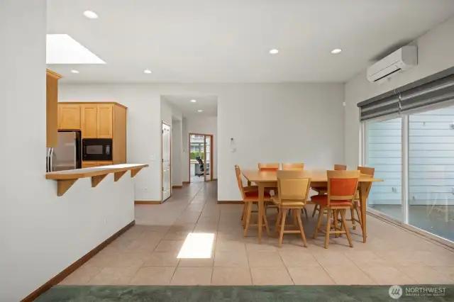 The dining room is large and this table (negotiable) can see eight easily with more seating available at the eating bar.