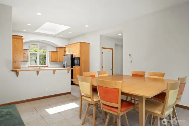 Looking across the dining area toward the kitchen.