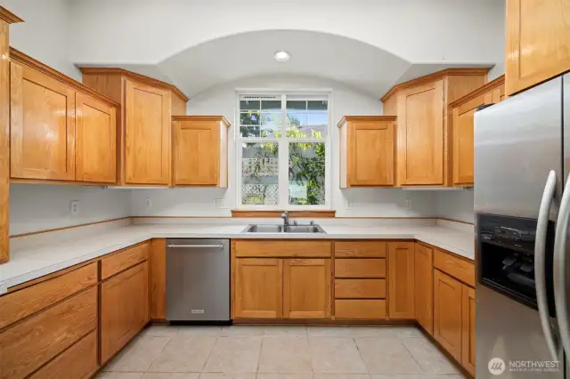There is a lot of cabinet storage space in the kitchen.