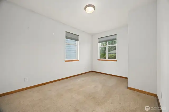The second bedroom is next to the office/den and near the full bath at the front of this unit.