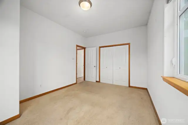 Looking across the 2nd bedroom toward the hallway.