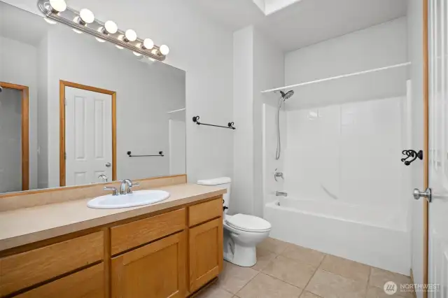 The full bath is near the 2nd bedroom and the office at the front of the unit.