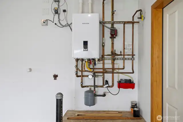 The radiant heating system has an on-demand hot water tank.
