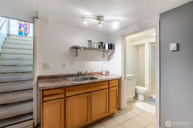 Kitchenet in the basement. 3/4 bath off to the side on the basement level.