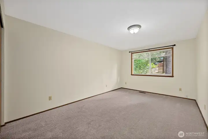 Primary bedroom looking towards the front yard
