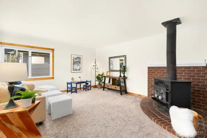 Wood burning stove with brick hearth.