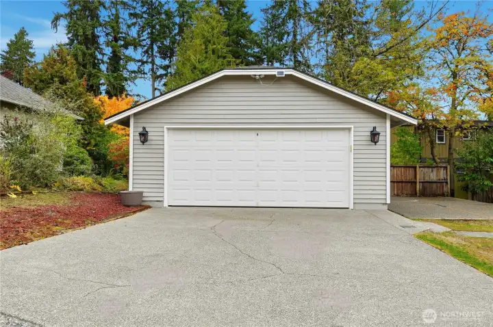 Detached two car garage with space for workbench.