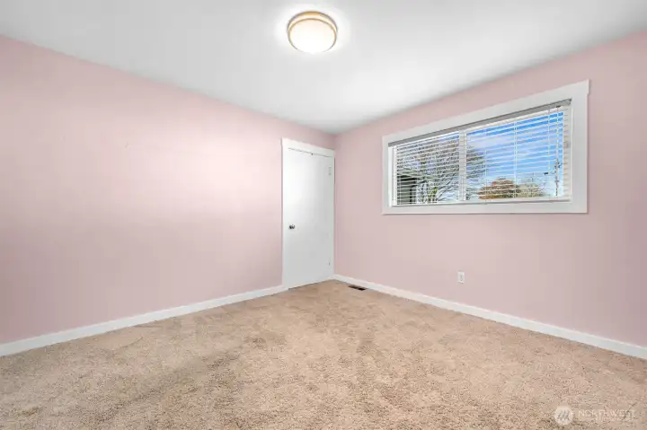 Second upstairs bedroom with large walk in closet.
