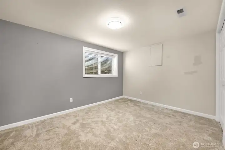 Third upstairs bedroom with big closet and storage.
