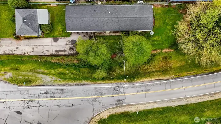 Intersection of Portal, Eaton and Cedar St. Small house in front off Eaton Ave, long duplex with 2 units along Portal