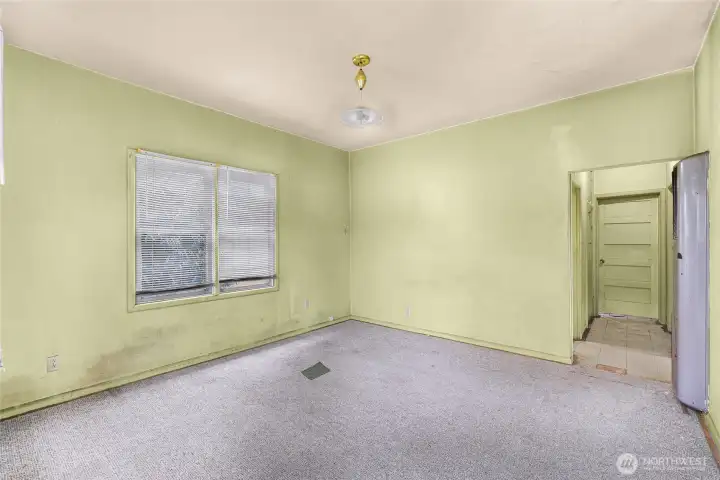 Small house - living room and hallway to the one bedroom