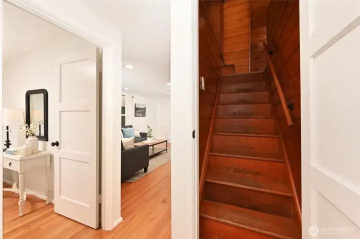 Classic "Lovell" built home with stairs to knotty pine upstairs bedroom.