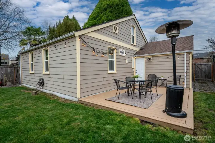 East side of home with door leading to garage.
